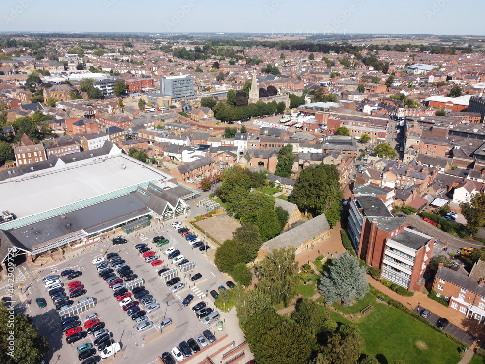 View of Wellingborough, Northamptonshire from the air looking across from Swanspool Gardens. Includes supermarket car park.