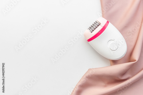 Hair remover epolator on silk - for gentle depilation