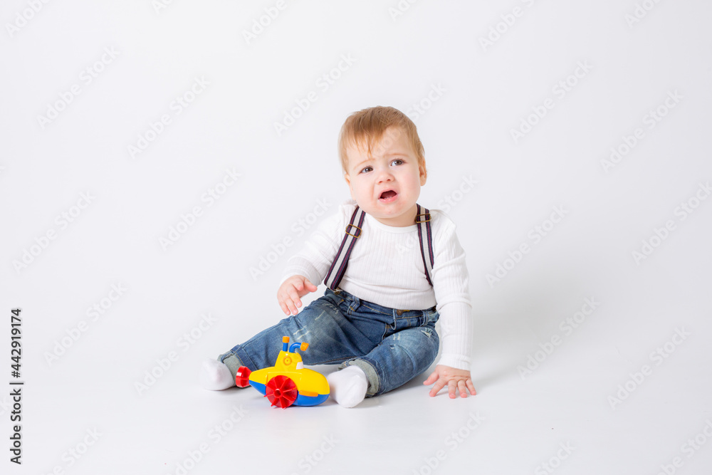 the boy is isolated on a white background with a pyramid crawling the boy is isolated on a white background with a pyramid crawling