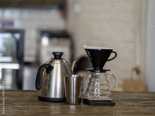 The process of brewing special coffee. Brewing coffee in a funnel. v-60 stages of brewing coffee. how to prepare a coffee filter, the brewing process. Work as a barista. Third wave coffee shop. 