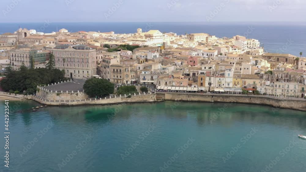 Beautiful drone view of a sunny day by the Mediterranean sea in Siracusa Ortigia Island, Sicily, Italy. Beautiful drone view of a sunny day by the Mediterranean sea in Siracusa Ortigia Island, Sicily, Italy.