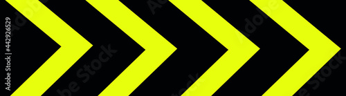 warning sign with black stripes on yellow background.