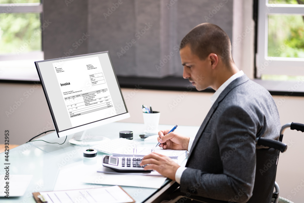 Fototapeta premium Disabled Accountant In Wheelchair Working