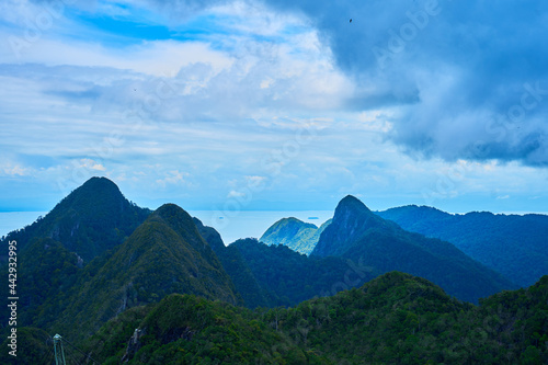 The incredible nature of a tropical island. Green mountains and perfect blue water. A heavenly place on earth