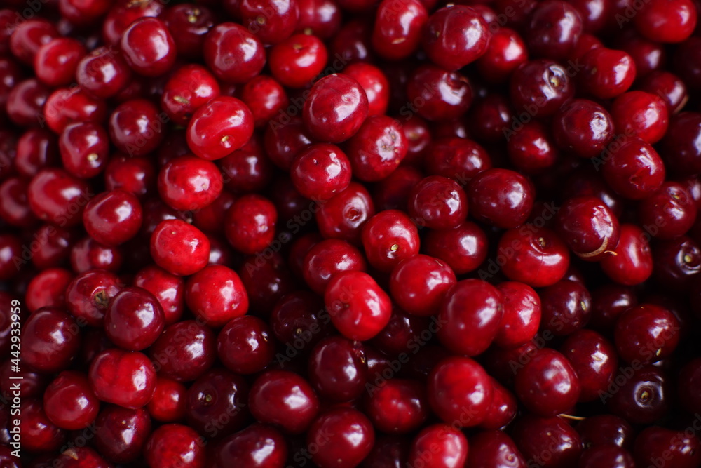 Ripe red cherries, top view, for background Ripe red cherries, top view, for background