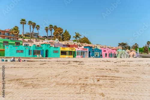 Colored houses near the coast in the city of Capitola. Summer day by the ocean. Capitola, USA - 19 Apr 2021