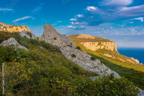 Temple of the Sun - rocks surrounded by forest in the mountains of Crimea, © Evdoha