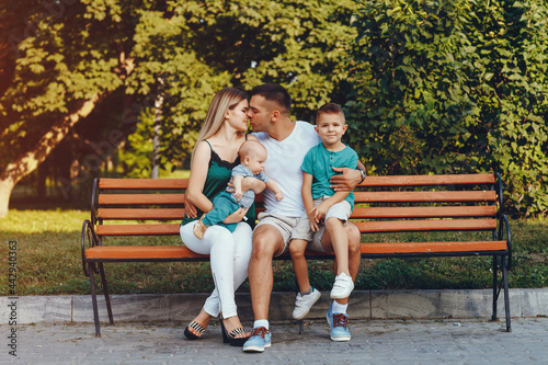 Cute family playing in a summer park