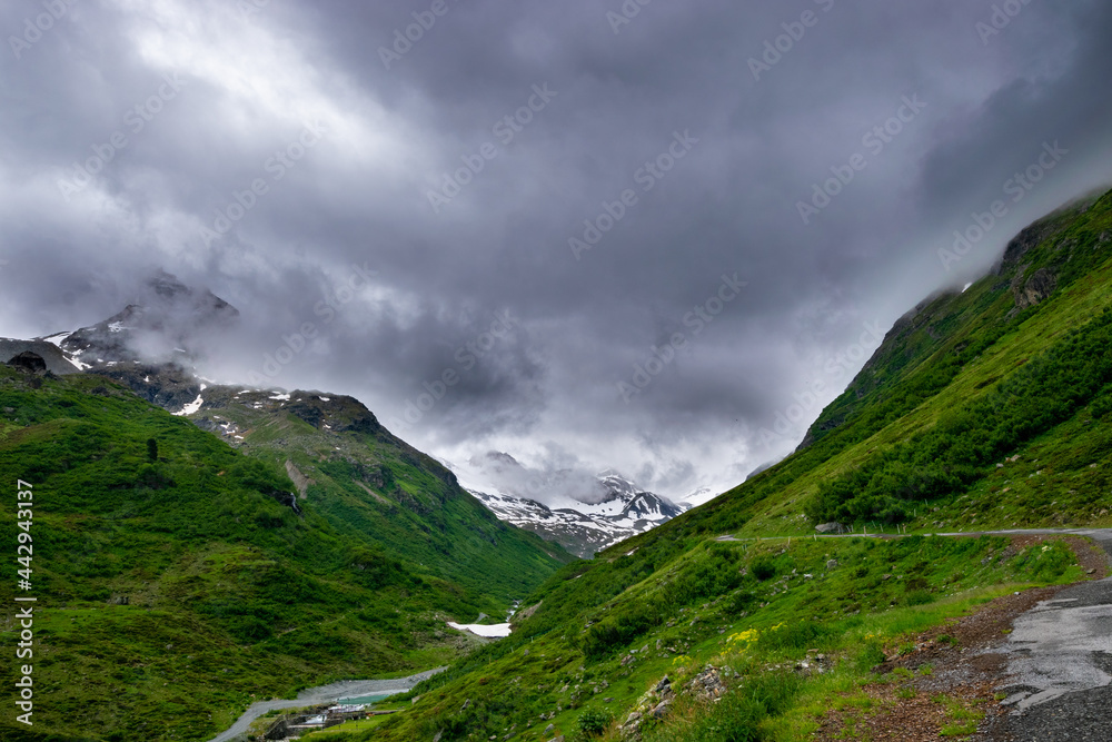 alpin road with dark clouds (Montafon, Austria)