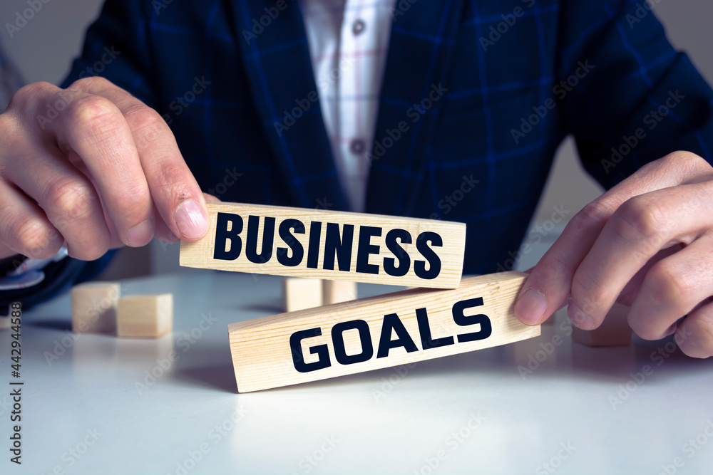 Obraz premium business GOAL word written on wood block.