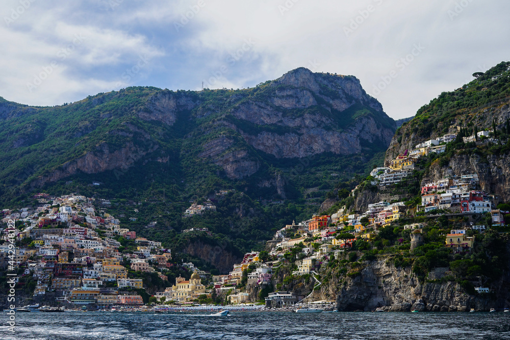 Positano view from Mediterranean sea on a summer day from the boat, Amalfi Coast, Salerno, Italy
