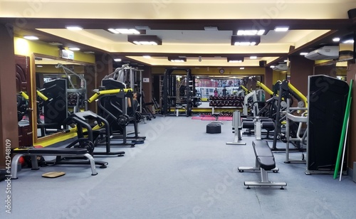 Fitness center interior. Gym.Interior view of a gym with equipment.