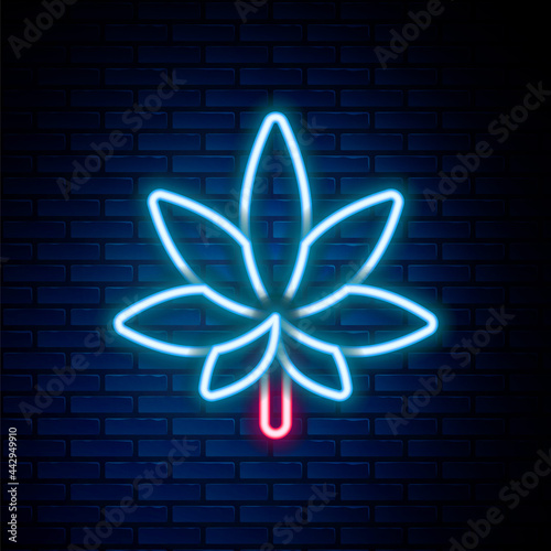 Glowing neon line Medical marijuana or cannabis leaf icon isolated on brick wall background. Hemp symbol. Colorful outline concept. Vector