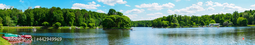 Panorama: a large pond in Tsaritsyno park in Moscow in summer