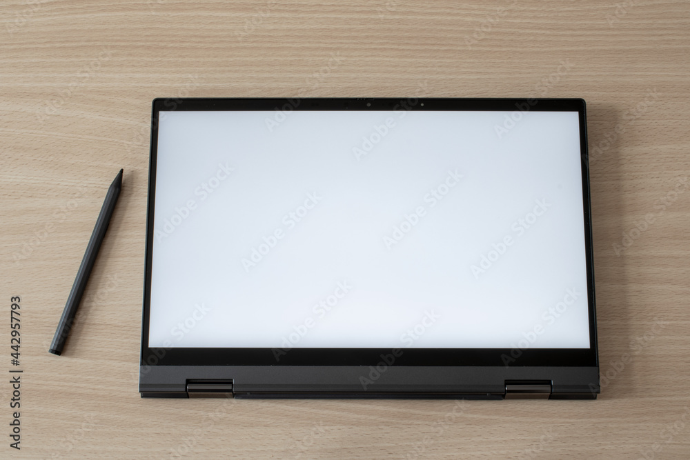 tablet pc with active pen on wooden table tablet pc with active pen on wooden table