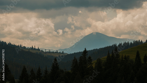 Amazing mountain landscape with blue sky with white clouds, sunny summer day in Carpathians, Ukraine