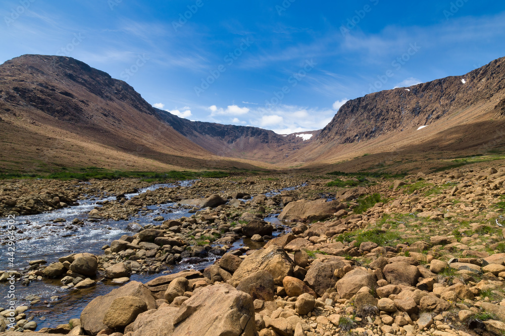 Rocky creek flowing down from mountains - Tablelands, Gros Morne, Newfoundland, Canada
