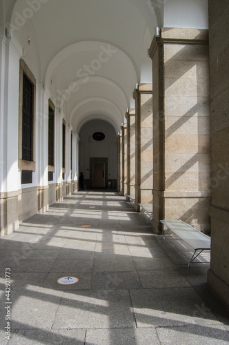 Interior gallery with windows through which light and sun enter the museum of Reina Sofia museum