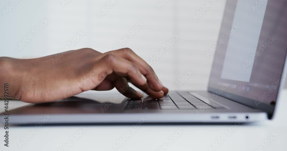 black guy typing slowly on laptop hands close up black guy typing slowly on laptop hands close up