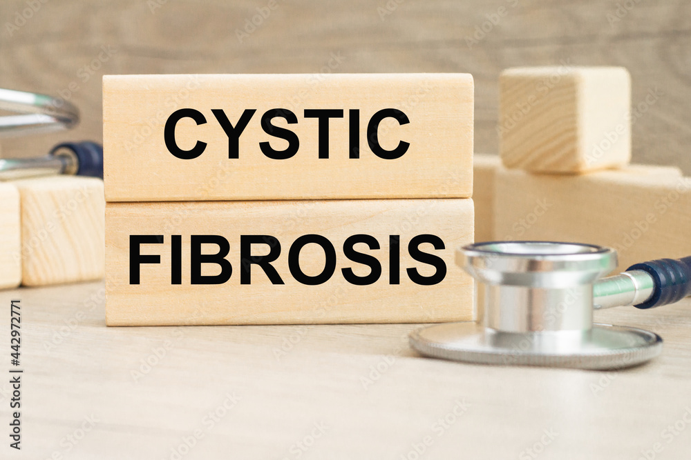 the word CYSTIC FIBROSIS is written on a wooden cubes structure . Can be used for Medical concept. the word CYSTIC FIBROSIS is written on a wooden cubes structure . Can be used for Medical concept.