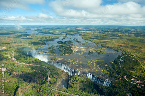 Victoria Falls or  Mosi-oa-Tunya  (The Smoke that Thunders) and Zambezi River Zimbabwe / Zambia border Southern Africa .
