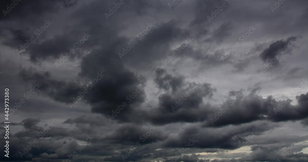 Ideal cloudy sky night timelapse 4K. Thunder clouds floating in the dark sky. Dramatic time lapse video. Ideal cloudy sky night timelapse 4K. Thunder clouds floating in the dark sky. Dramatic time lapse video.