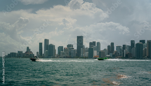 city skyline at sunset boats life vacation sea water miami florida usa buildings ocean view panorama clouds sky  