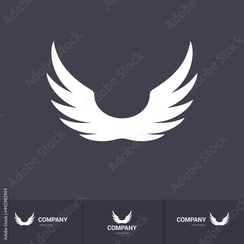 Pair Wings of Bird Icon in Flat Style. Winged Logo Company Icon Flying, Eagle, Falcon, Phoenix, or Hawk Wings. Brand or Logotype on Dark Background