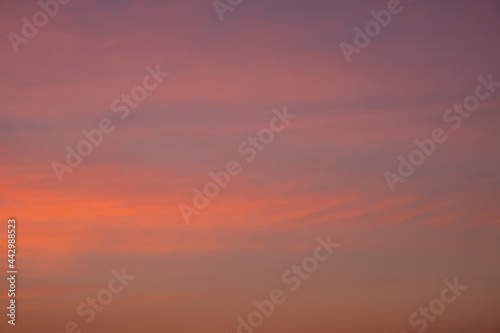 the sky in warm soft colors, sunrise, sky background © Fukume