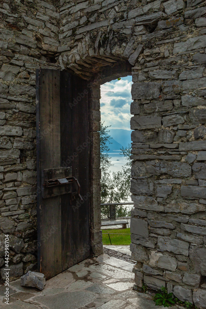 The village Perledo and the castle Vezio are situated above the village Varenna on the border of Lake Como. The village Perledo and the castle Vezio are situated above the village Varenna on the border of Lake Como.