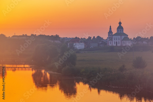 Church of Elijah the Prophet at the Kamenka river, Russia. Summer sunny day sunset