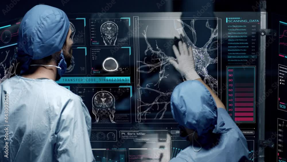 Professional doctors analyzing patient's medical MRI diagnosis by checking on a large glass screen with futuristic holograms. Concept of: medicine, doctors, future, holographic, brain scan
