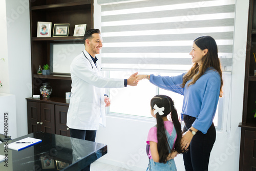 Hispanic family visiting the doctor for a check-up