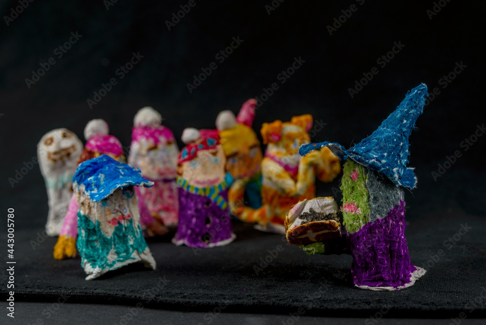 Fototapeta premium Scary baby finger puppets made of papier mache on hand isolated