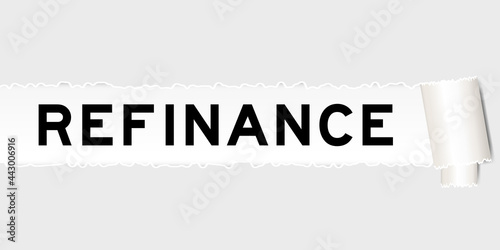Ripped gray paper that have word refinance under torned part