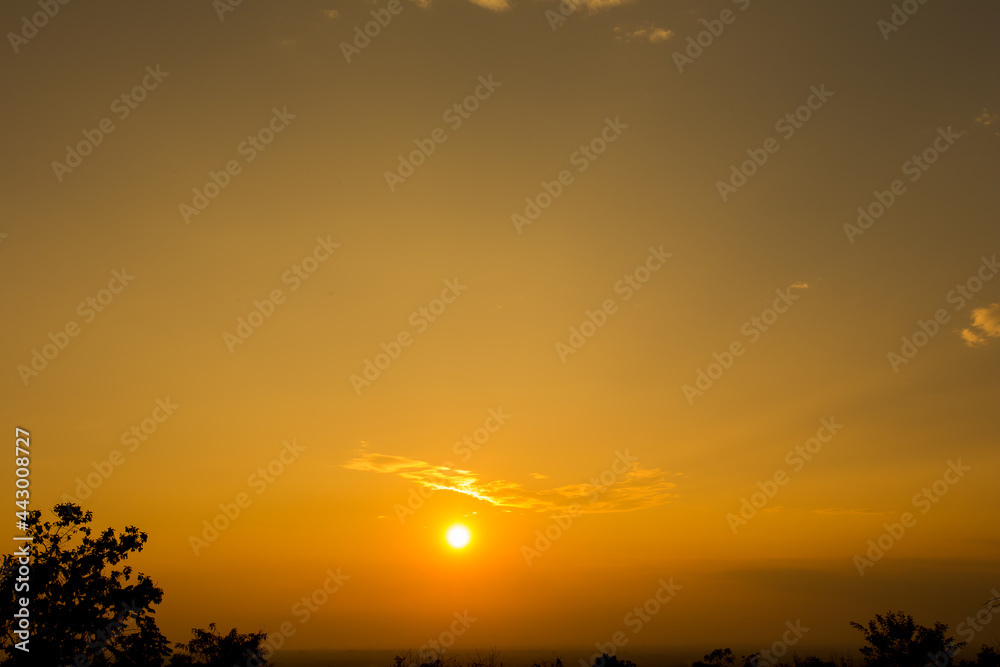 Colorful dramatic sky with cloud at Sunrise.Sky with sun background Colorful dramatic sky with cloud at Sunrise.Sky with sun background