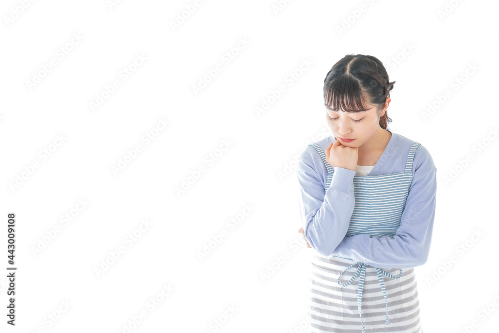 悩む若い主婦 悩む若い主婦