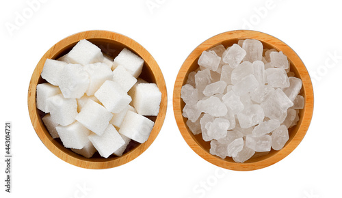 Rock sugar in wood bowl on white background