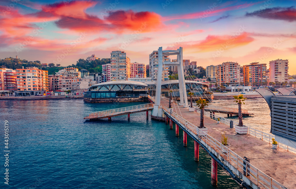 Fototapeta premium Spectacular sunrise in Durres, port city on the Adriatic Sea in western Albania, Europe. Impressive Adriatic seascape. Exotic spring scene of Albania. Traveling concept background.
