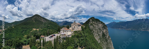 Aerial panorama of the historic church Eremo di Montecastello on Lake Garda. Panorama Eremo di Montecastello  Italy aerial view. Historic catholic church on the mountain  background of the Alps.
