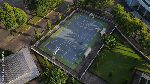Aerial view  basketball court taking photos in the morning