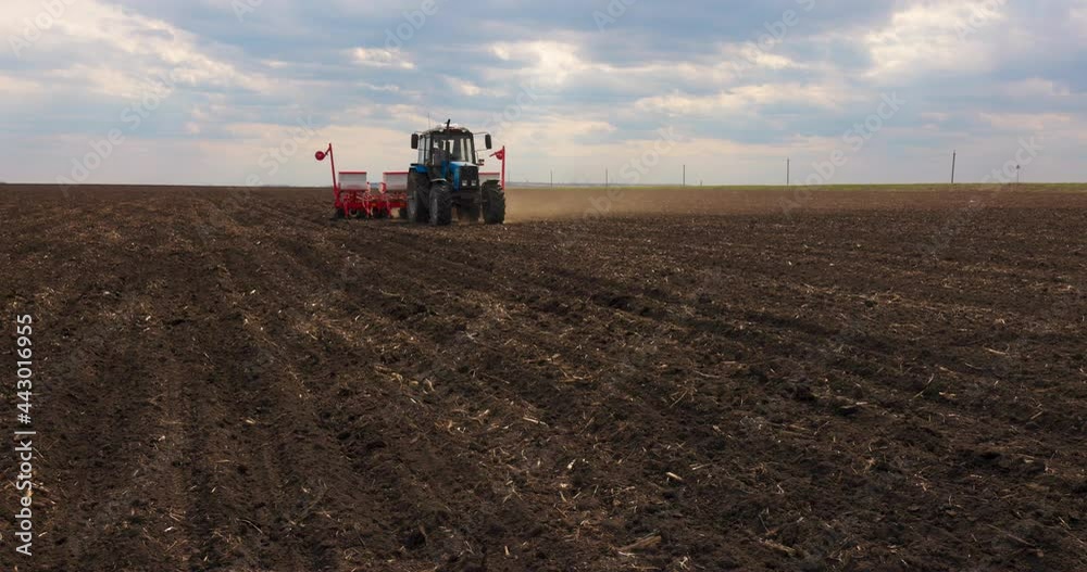 Agriculture Farm Tractor Seeding Machine Field Seeder Village Planter Rural Working Combine Tillage Plowing Agricultural Equipment Season Sowing Grain Spring time Process Planting Seeds Slow motion Agriculture Farm Tractor Seeding Machine Field Seeder Village Planter Rural Working Combine Tillage Plowing Agricultural Equipment Season Sowing Grain Spring time Process Planting Seeds Slow motion