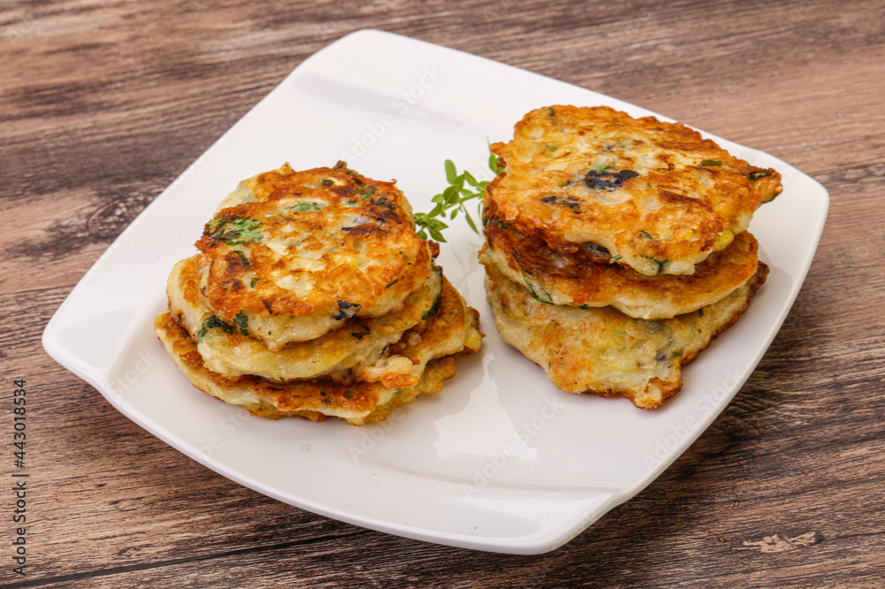 Zucchini pancakes with herbs and spices