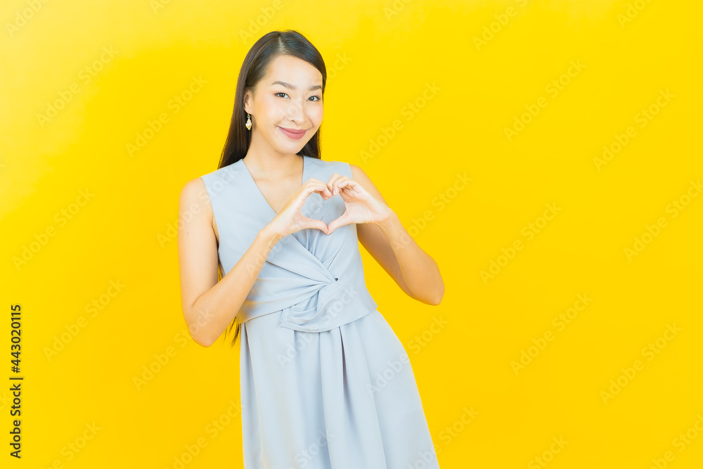 Portrait beautiful young asian woman smile with action Portrait beautiful young asian woman smile with action