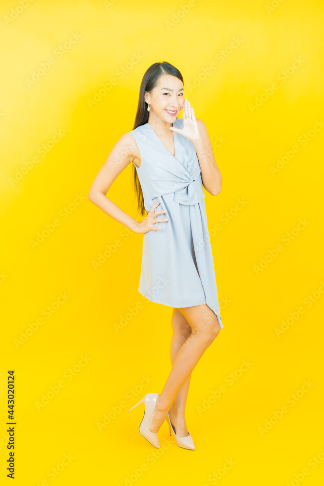 Portrait beautiful young asian woman smile with action Portrait beautiful young asian woman smile with action