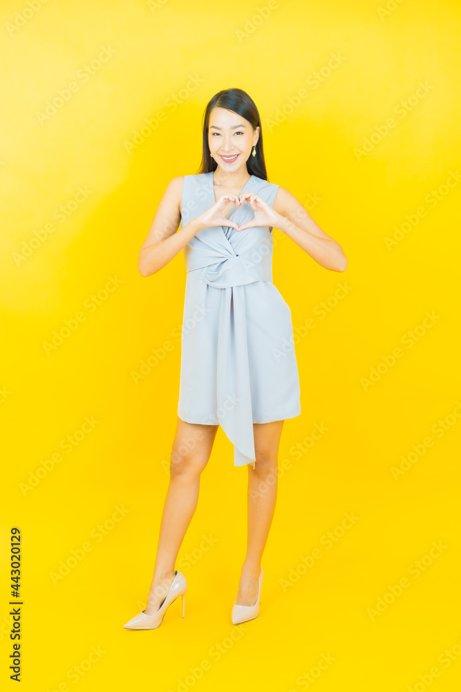 Portrait beautiful young asian woman smile with action Portrait beautiful young asian woman smile with action