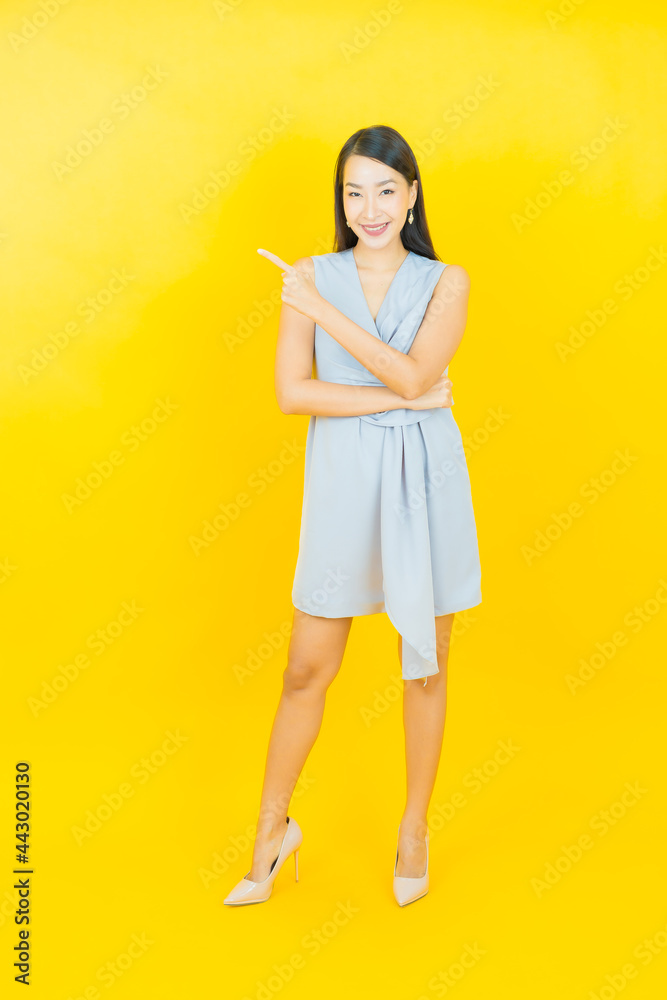 Portrait beautiful young asian woman smile with action Portrait beautiful young asian woman smile with action