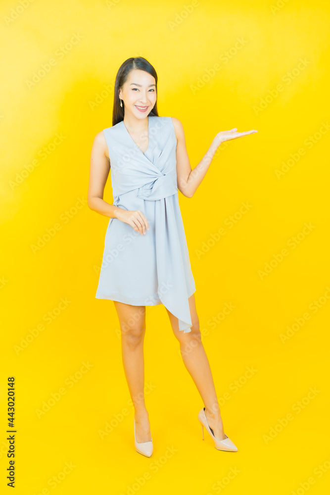 Portrait beautiful young asian woman smile with action Portrait beautiful young asian woman smile with action
