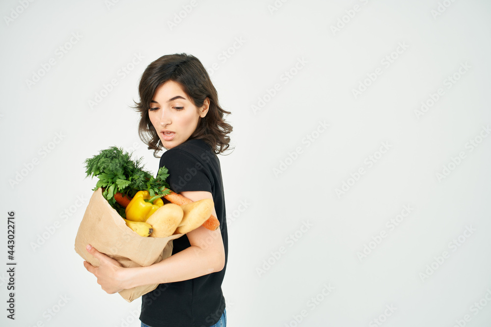 brunette in black t-shirt grocery bag delivery service brunette in black t-shirt grocery bag delivery service