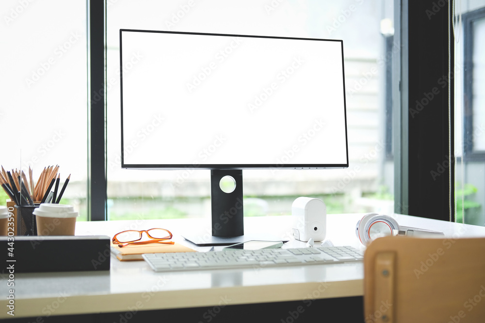 Creative workspace with computer, houseplant and office supplies on white table. Creative workspace with computer, houseplant and office supplies on white table.